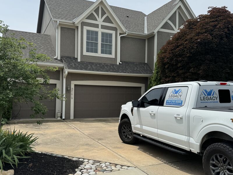 Legacy Roofing crew completing a roofing project in Kansas City